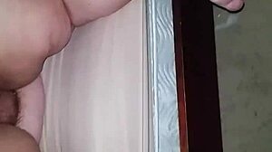 The bbw milf fucks herself with a huge dildo, focusing on her big ass