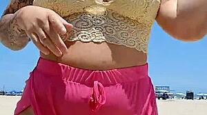 I found a lover at the beach and tease him by going almost naked.