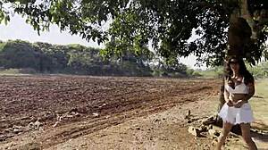 Shameless Monika Fox with Naked Tits Pissing Outdoors Under a Tree Free