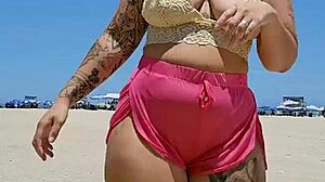 I found a lover at the beach and tease him by going almost naked.