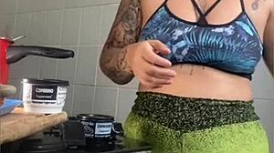 married lady pretends to cook online, but flashes her swollen pussy instead