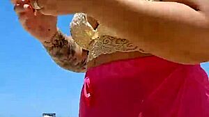 I found a lover at the beach and tease him by going almost naked.