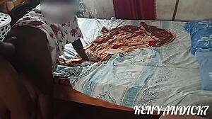 sexy african wife seduces husband in bedroom with tickling