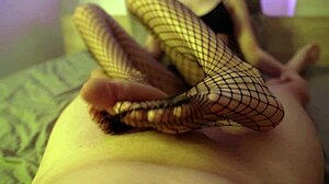 she teases with fishnet footjob, i cum on her ass