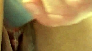 The tip of my tongue gets wet while masturbating my redhead milf pussy in close-up