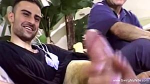 lovely wife gives handjob to other man in swinging