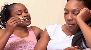 Two Black Beauties Licking and Exploring on Bed