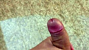 Brazilian amateur jerks huge cock for massive cumshot in garage