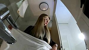 Hot Blonde Babe in Pantyhose and Heels Strips in Bathroom Miniskirt