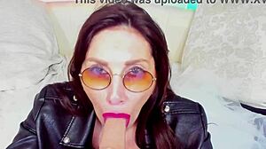 Hot milf makes blowjob in glasses for homemade fun.