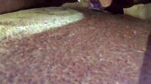 Amateur in car using toys for relaxation