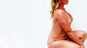 Savanna brown poses nude, revealing her shaved wet pussy for the horny photographer