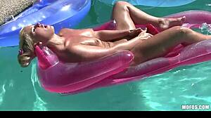 bikini blonde strips and masturbates outdoors or does she orgasm?