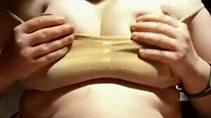 Hey check out this petite 18+ in lingerie playing with her big tits pov