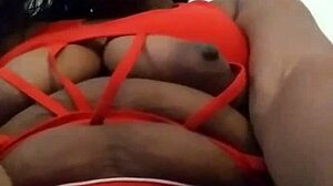 Ooh, The Sexy Ebony Woman With Tattoo Performs Actions.