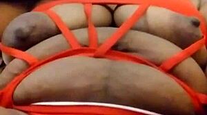 Ooh, The Sexy Ebony Woman With Tattoo Performs Actions.