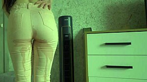 Female desperate to pee wets her jeans and panties.