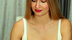 Cute blonde shows off her big tits?