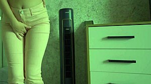 Female desperate to pee wets her jeans and panties.