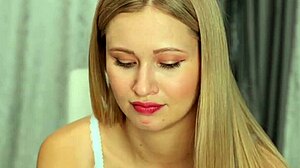 Cute blonde shows off her big tits?