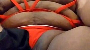 Ooh, The Sexy Ebony Woman With Tattoo Performs Actions.