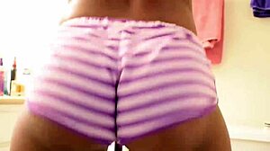 milf gives a handjob, clothes ripping as she strokes that big black cock