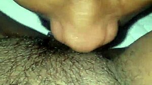 Ebony girl enjoys detailed oral sex on her pussy