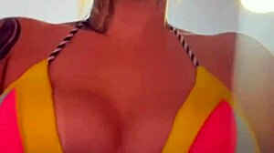 Amateur gets soaking wet pussy training in thong bikini at beachfront gym.