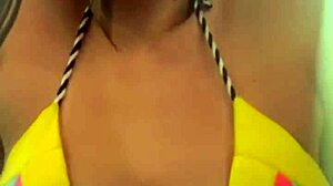 Amateur gets soaking wet pussy training in thong bikini at beachfront gym.