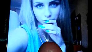 A cute beautiful girl jerks something in this video scene