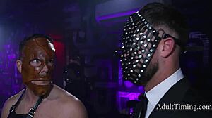 Pornstars Engage in Leather Gangbang Orgy