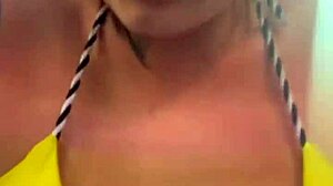 Amateur gets soaking wet pussy training in thong bikini at beachfront gym.