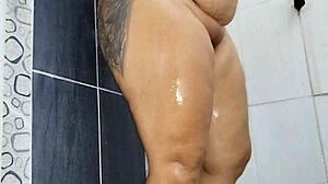 Chubby girl fingers herself in bathroom to a wet finish