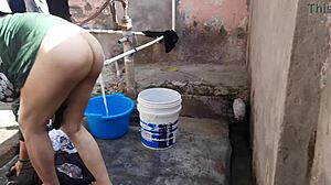 sexy big boobs bhabhi takes a steamy outdoor bath. her wet curves shine in public!