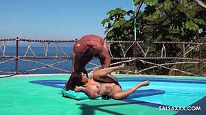 Tattooed latina with big silicone tits gets freaky by the pool