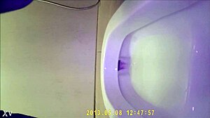 Hidden camera shows asian teen using the bathroom discreetly