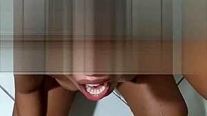 She takes piss and pays with a blowjob