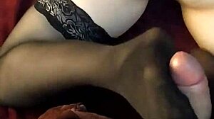 Trying a footjob in stockings for the first time