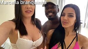 Two sexy brunettes in lingerie enjoy a threesome with a monster cock, deepthroating and taking cum without condoms.