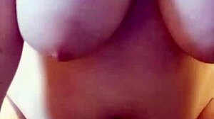 Oiled up chubby babe riding hard with big natural tits bouncing.