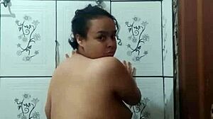 young pornstar shows wet pussy sensually, craving cock in shower