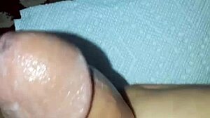 Enjoying a solo session with adult videos