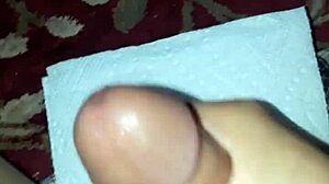 Enjoying a solo session with adult videos