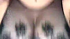 In stockings on the body mesh fucks huge natural tits from above