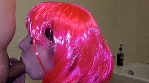 Sexy miss pink kneels for cock sucking session