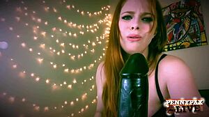 Teasing Penny Pax plays with huge BBC dildo.