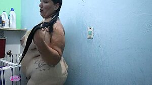 latina girl bathes with big natural tits sensually