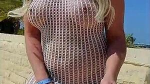 I wore a transparent dress without underwear, showing my big tits as a young exhibitionist