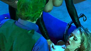 Big boob superheroines seduce horny heroes in group scene.