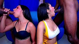 Two street whores give blowjobs